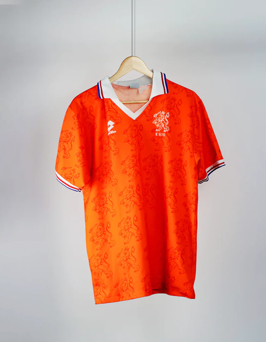 1994 Home Netherlands football shirt - orange lions on an orange shirt with white, red, and blue cuffs and collar